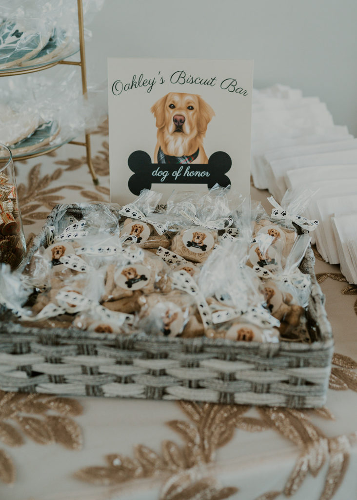 A basket of dog treats as party favors at a wedding.